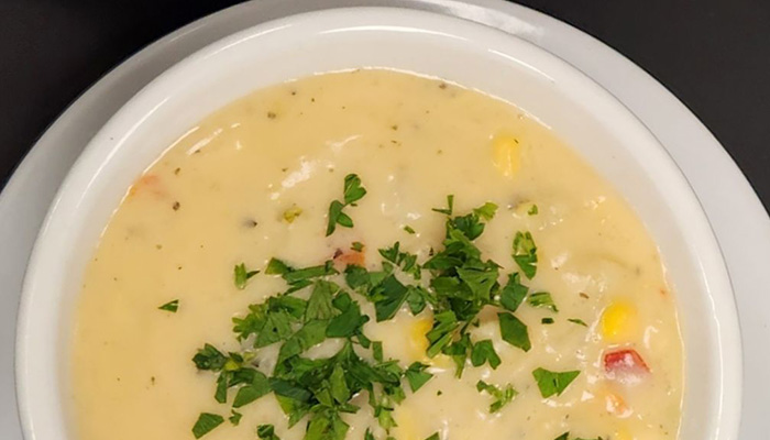 Bowl of Chartroom Chowder prepared by The Chartroom at Rivers End Restaurants in Racine Wisconsin.