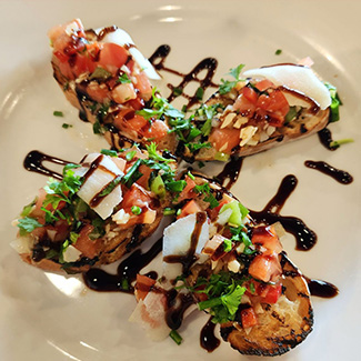 Chartroom Food & Spirits serves decadent bruschetta appetizers in Racine WI.